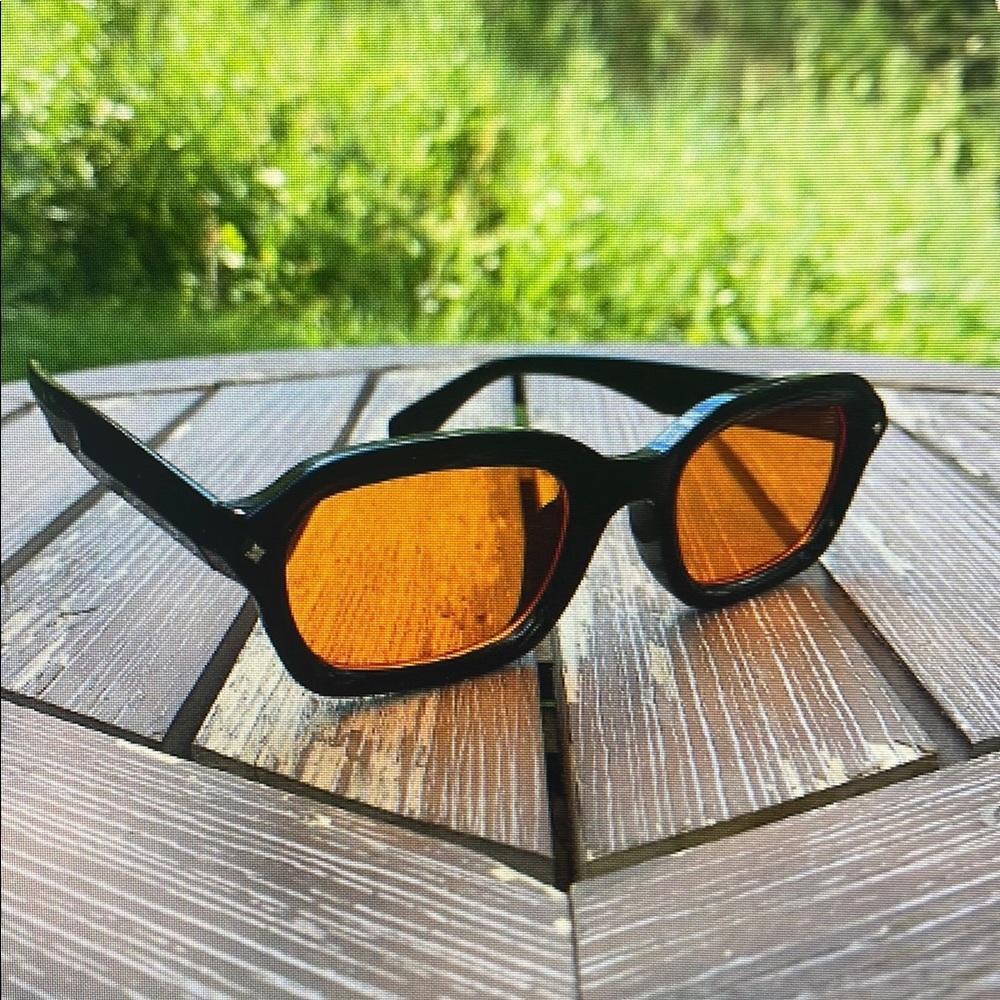 Stylish Black Sunglasses with Orange Lenses